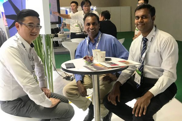 our-colleague-explaning-in-powergen-2019-enlit-asia